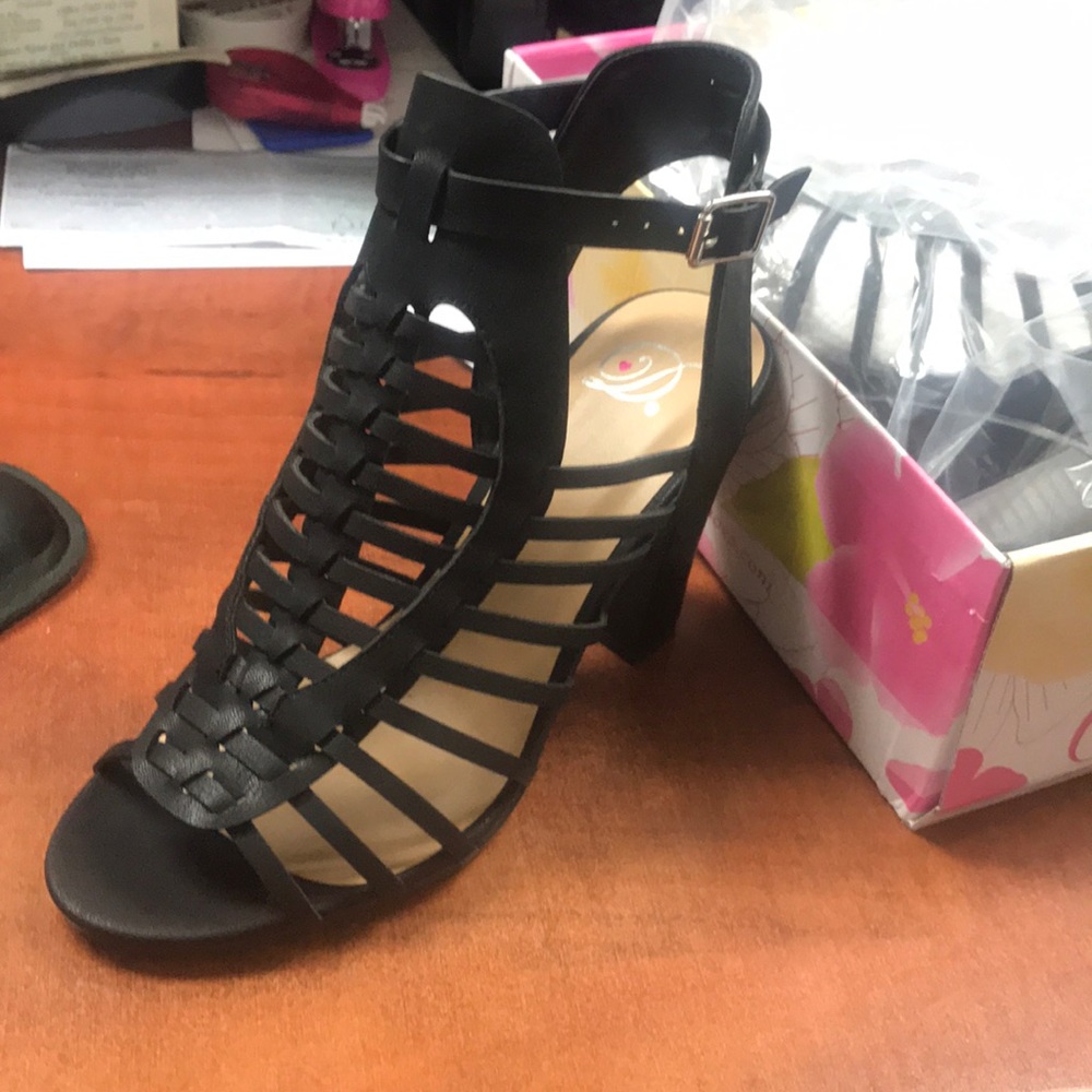 Caged black heels